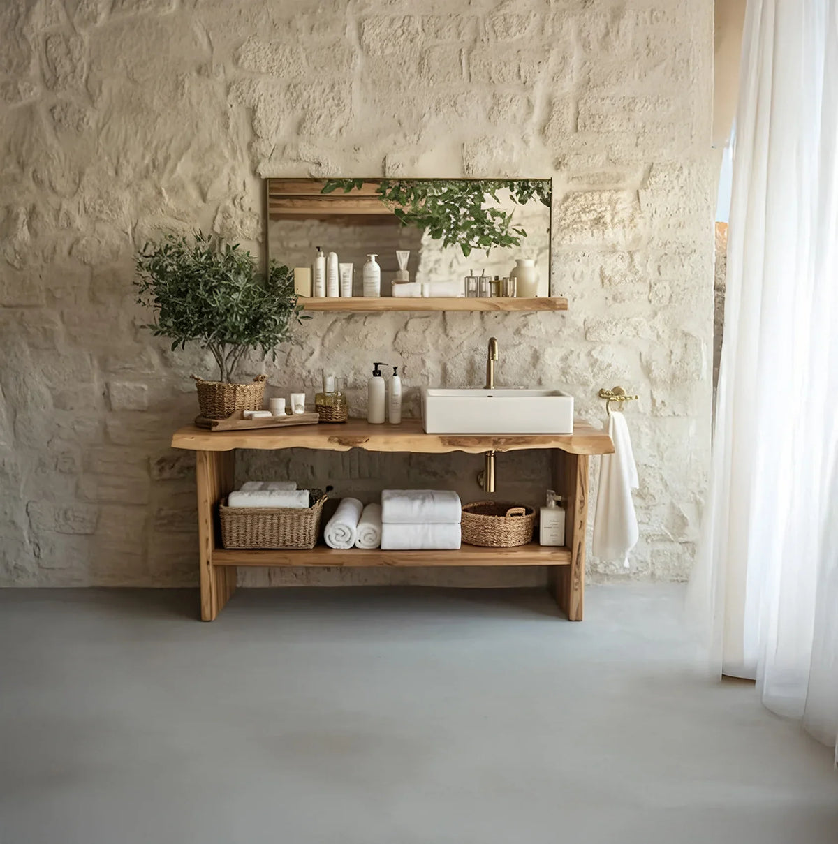 Live edge wood bathroom vanity with vessel sink, stone wall, and natural decor