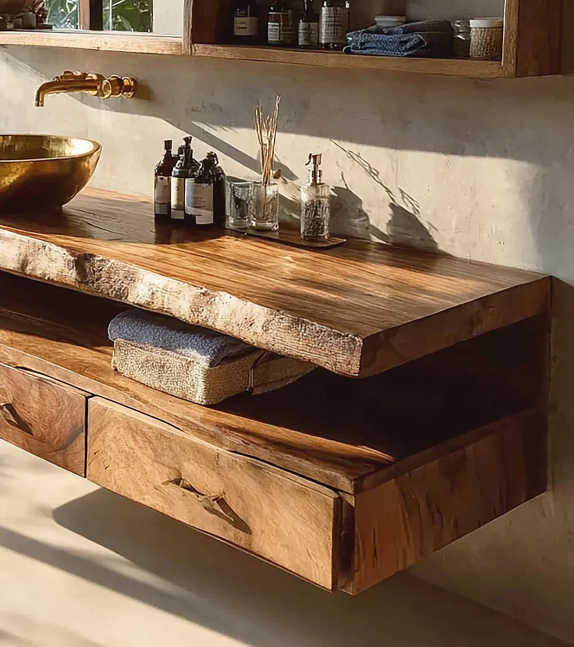 Rustic wooden bathroom vanity with brass vessel sink, wall-mounted faucet, and natural sunlight