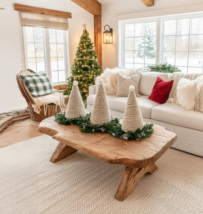 Cozy living room with rustic wooden coffee table and wrapped cone Christmas decorations