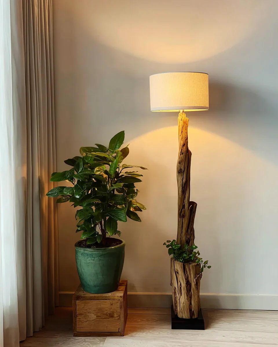 Sustainably crafted solid wood floor lamp with planter, next to a potted plant in a cozy room