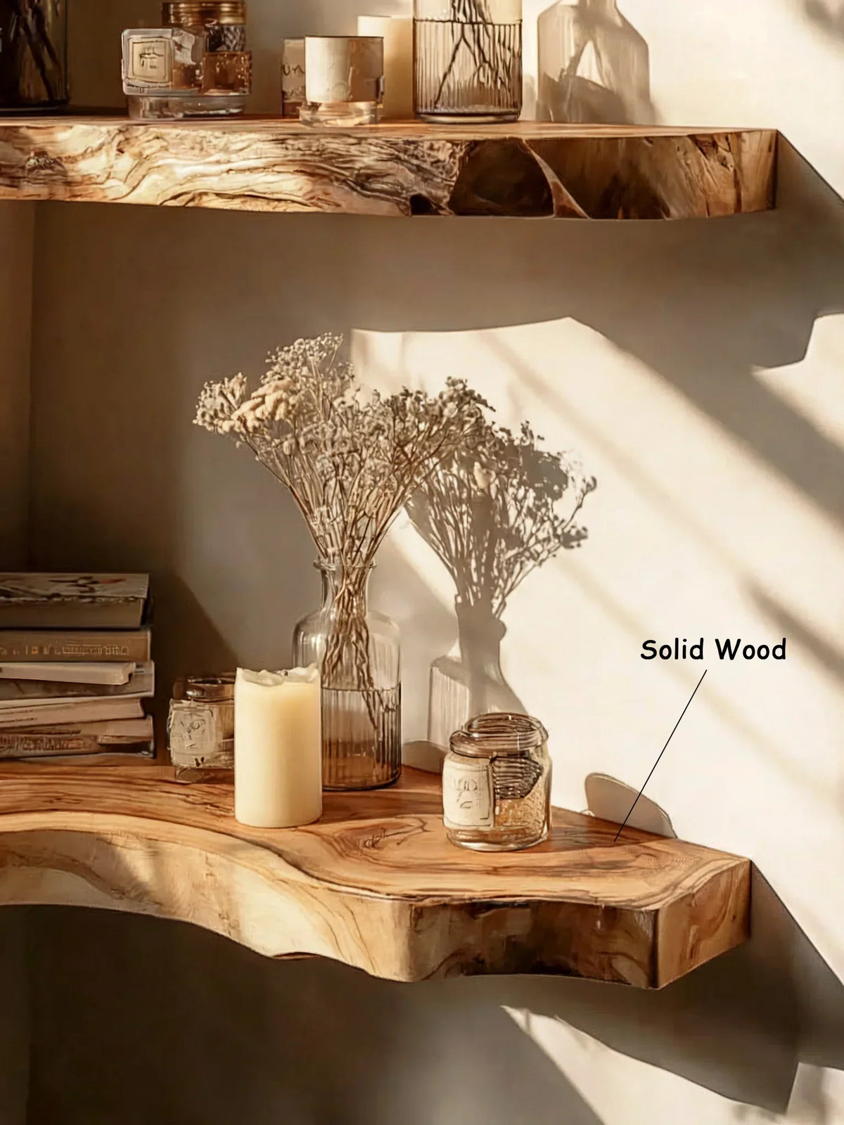 Solid wood live edge floating shelves with candles, books, and glass vases in natural light.
