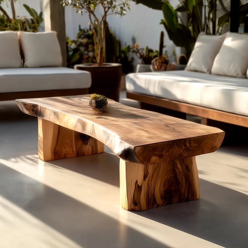 Live edge solid wood coffee table in sunlit modern living room with plants and sofas