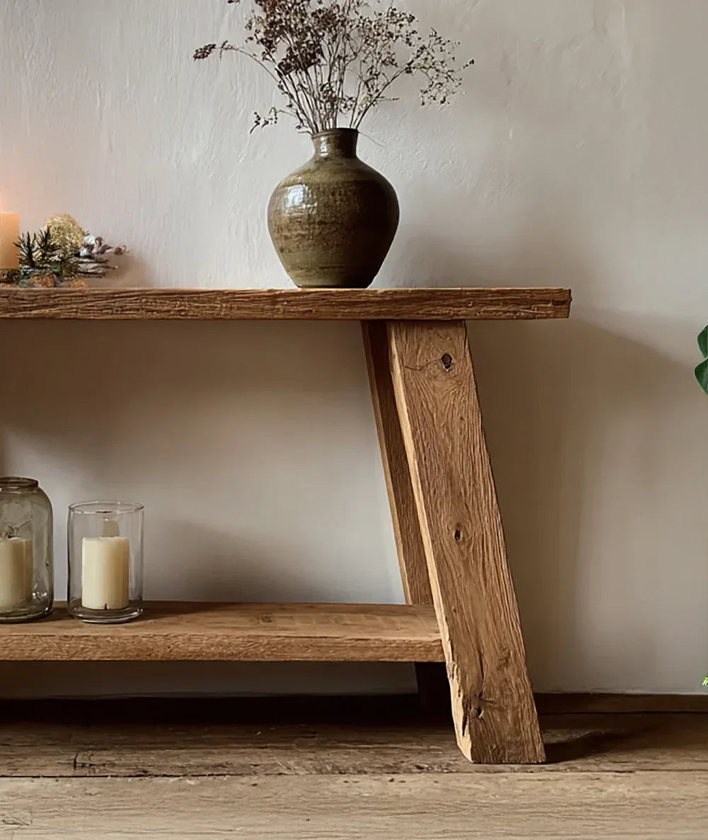 Sustainably crafted solid wood console table with rustic vases and candles, live edge design