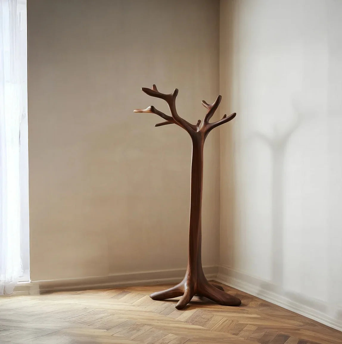 Solid wood tree branch coat rack in minimalist corner, sustainable furniture design