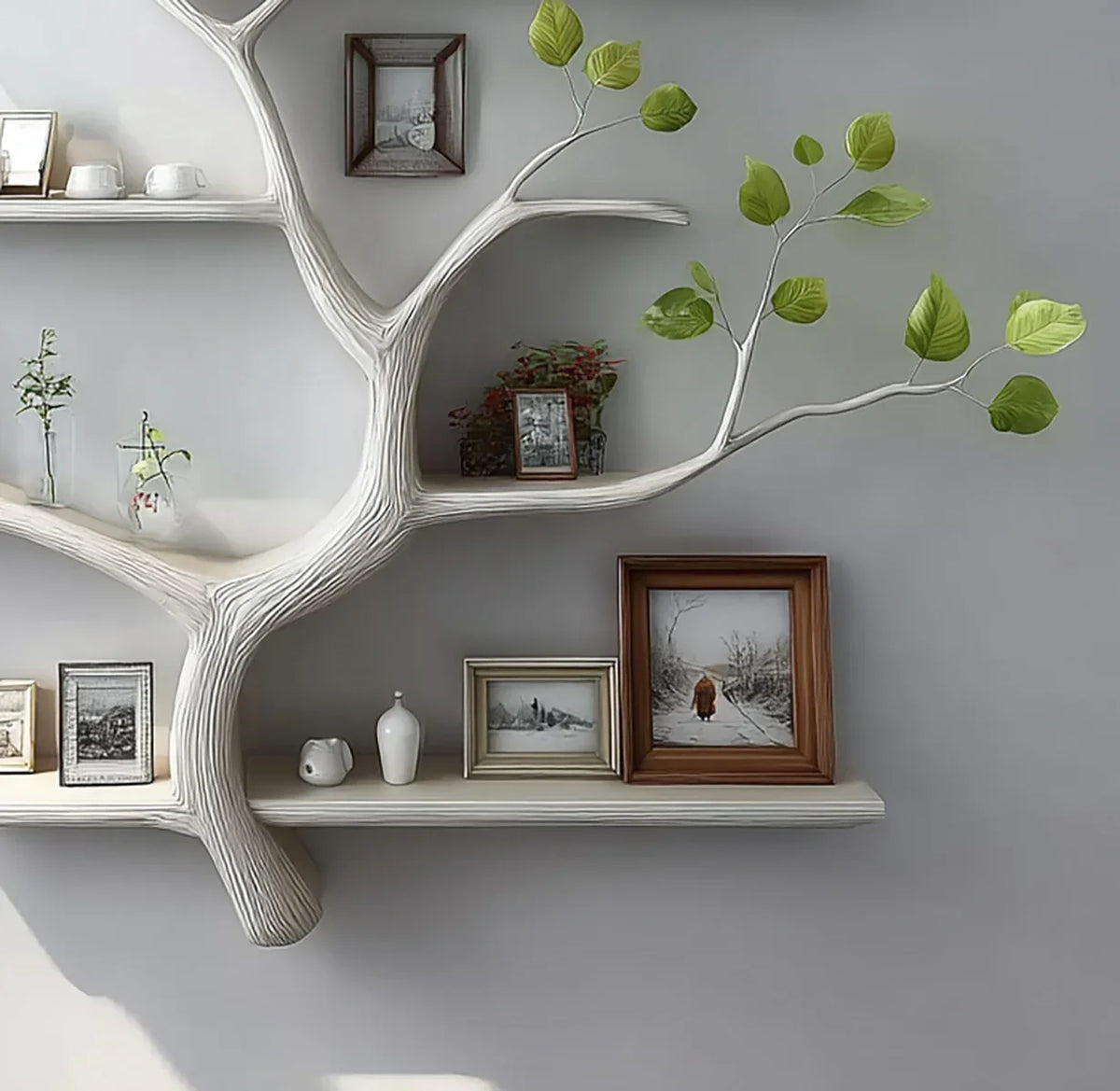 Tree-shaped wooden bookshelf with live edge shelves, home decor and framed photos
