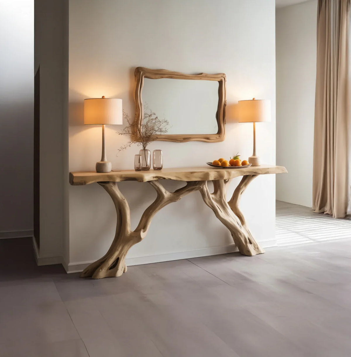 Live edge solid wood console table with tree branch legs, matching mirror, and decor in modern room