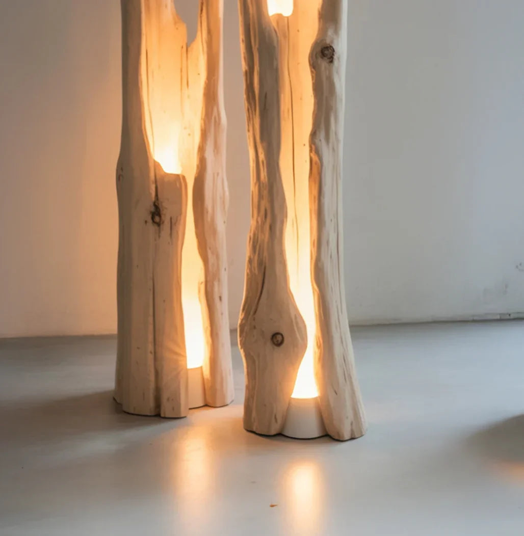 Modern wooden floor lamps with natural tree trunk design glowing warmly in minimalist room