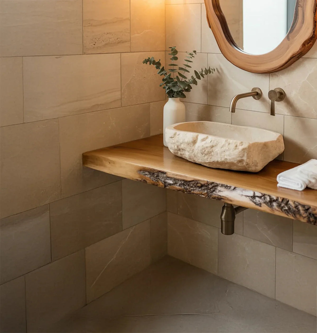 Live edge wood bathroom vanity with stone vessel sink, wall mirror, and minimalist decor