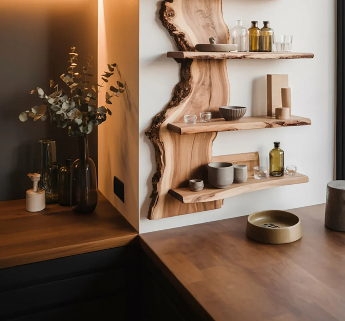 Live edge floating wood shelves with decor in a modern kitchen corner setting