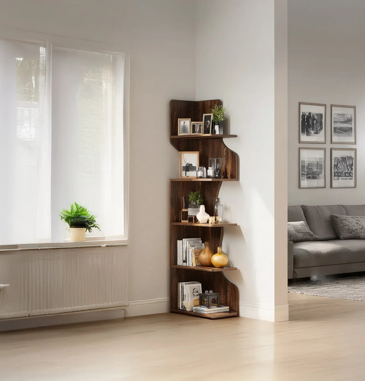 Modern living room corner with wooden corner shelf holding books, vases, and framed photos