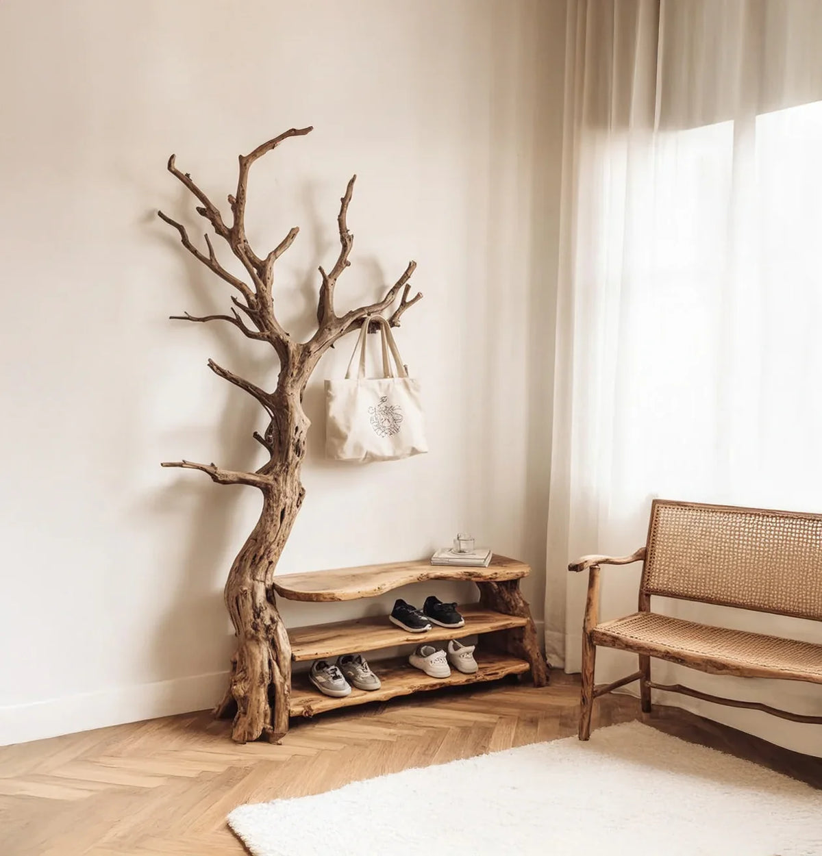 Live edge tree bookshelf with branches, wooden shoe rack, and woven bench in a minimalist room