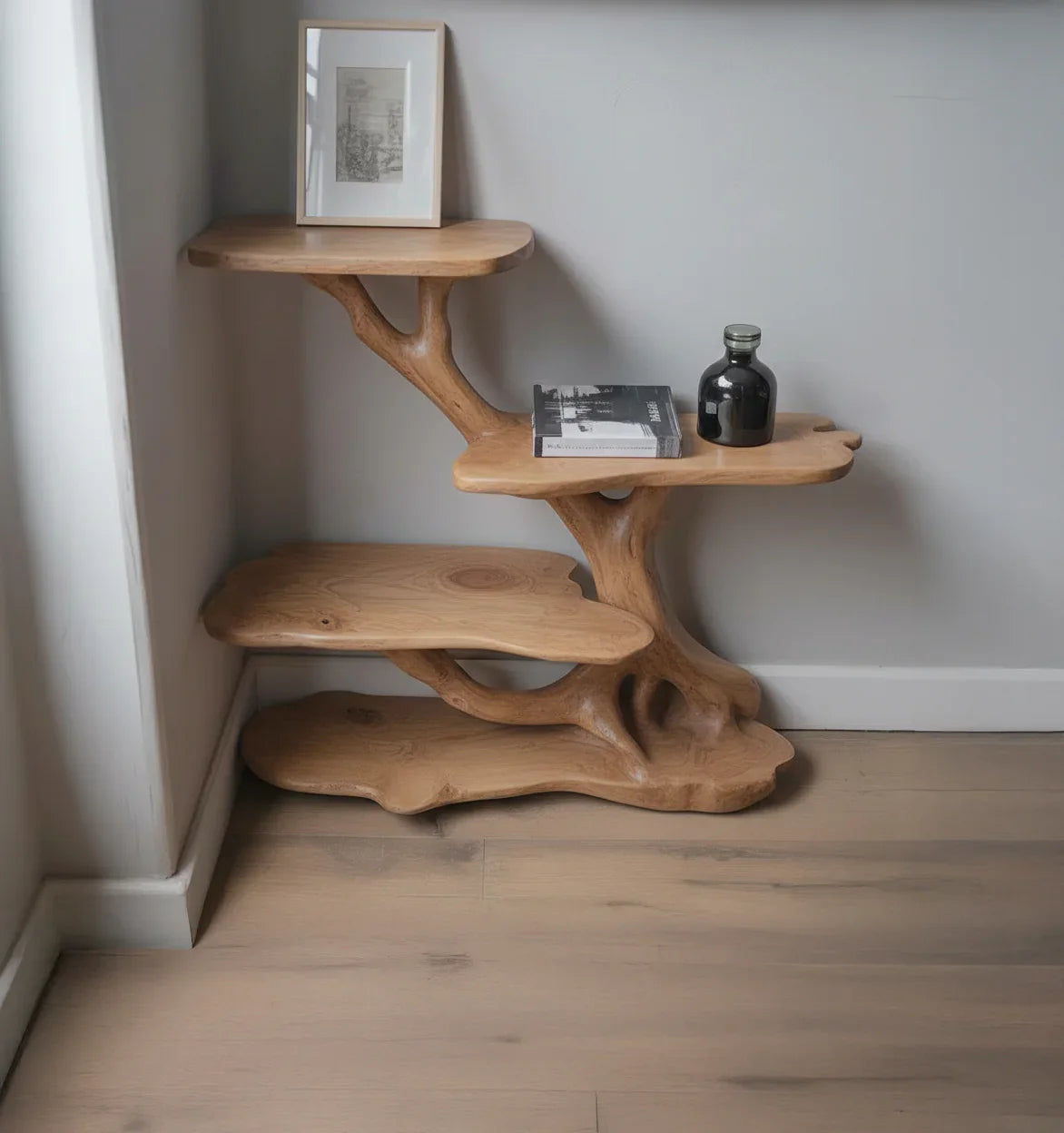 Natural solid wood corner shelf with live edge design, books, and decorative items.