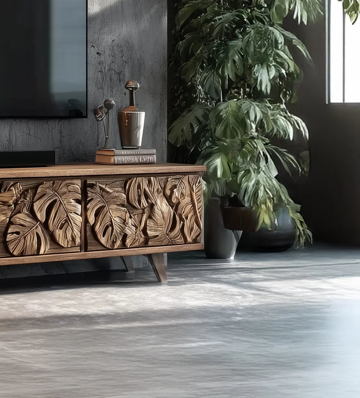 Solid wood TV console with carved leaf design in a modern living room, large indoor plant nearby.