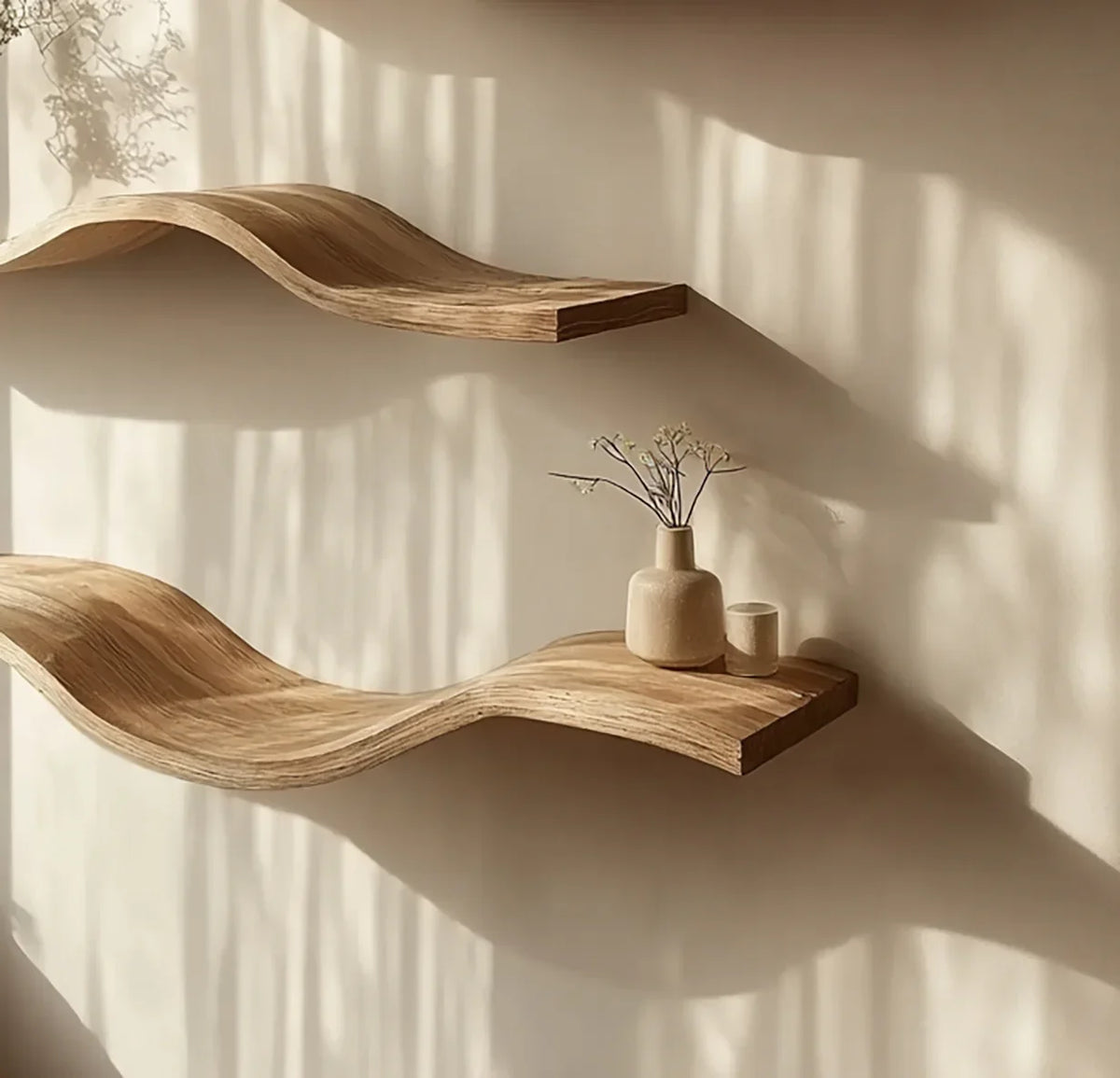 Curved floating wood shelves on wall with small vases, minimalist modern decor