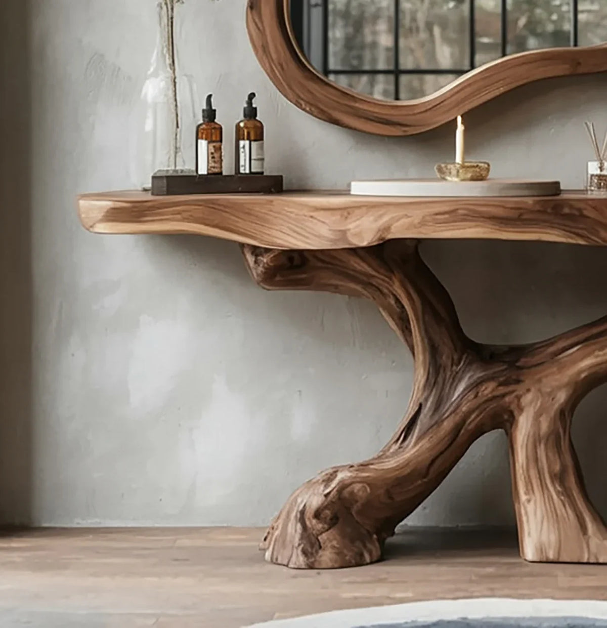 Live edge solid wood console table with tree branch base and organic shaped mirror
