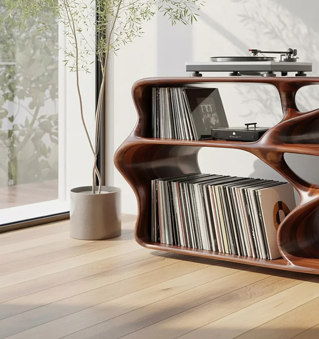 Modern solid wood vinyl record shelf with turntable, near window and plant, on hardwood floor