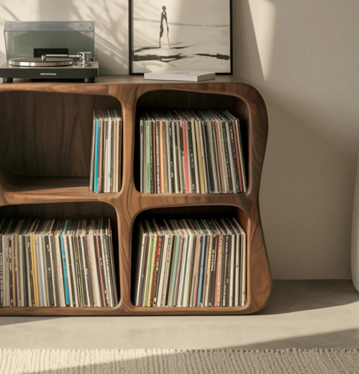 Solid wood vinyl record storage shelf with rounded edges, turntable, and modern decor