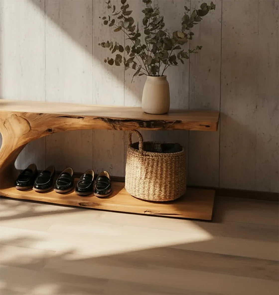 Live edge solid wood entryway bench with shoes, woven basket, and vase on top