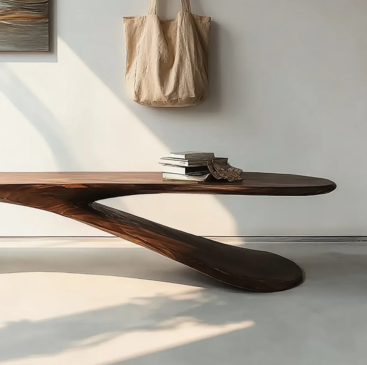 Modern live edge solid wood table with sculptural base in minimalist room