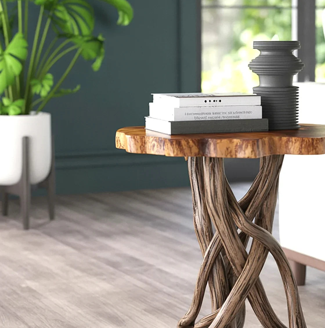 Live edge solid wood side table with twisted wood legs, books, and candle in modern living room