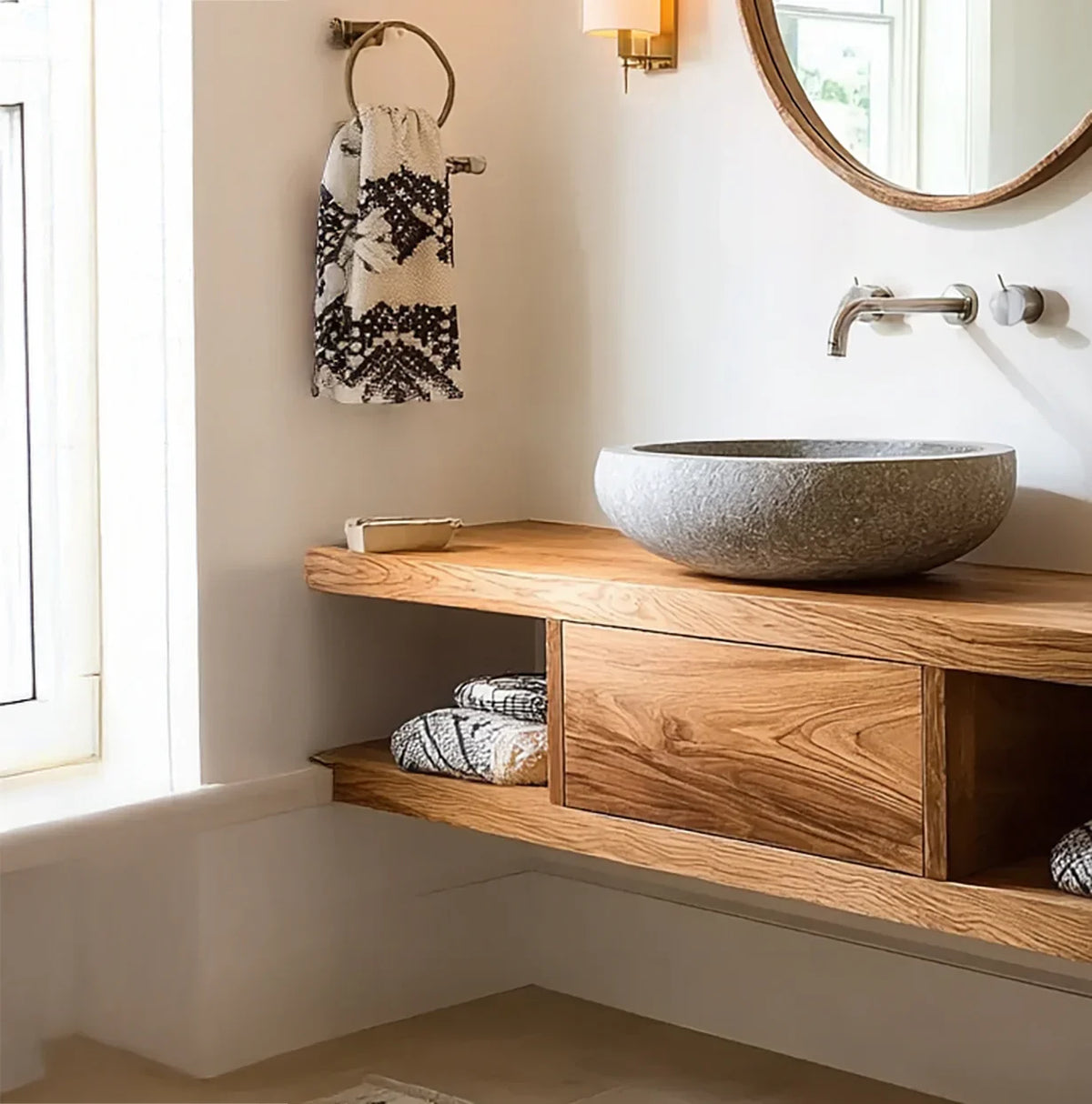 Solid wood floating vanity with stone vessel sink and modern bathroom decor