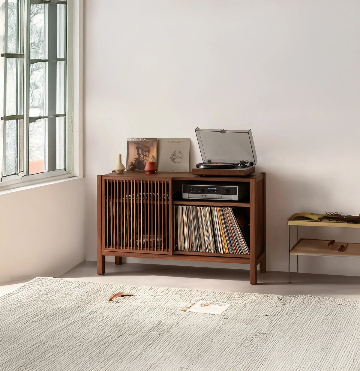 Solid wood record console with turntable, vinyl storage, and modern decor in a bright room