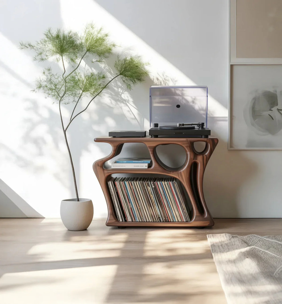 Sculpted solid wood media console with vinyl records, turntable, and modern decor in sunlight.