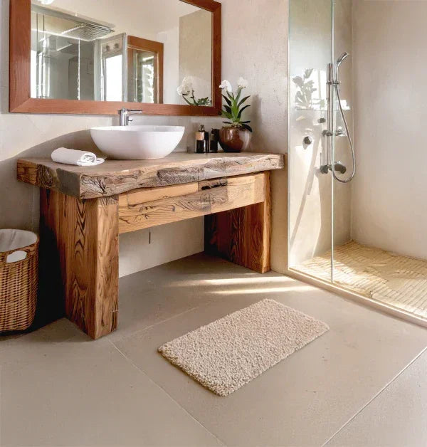 Modern bathroom with live edge solid wood vanity, vessel sink, and glass shower